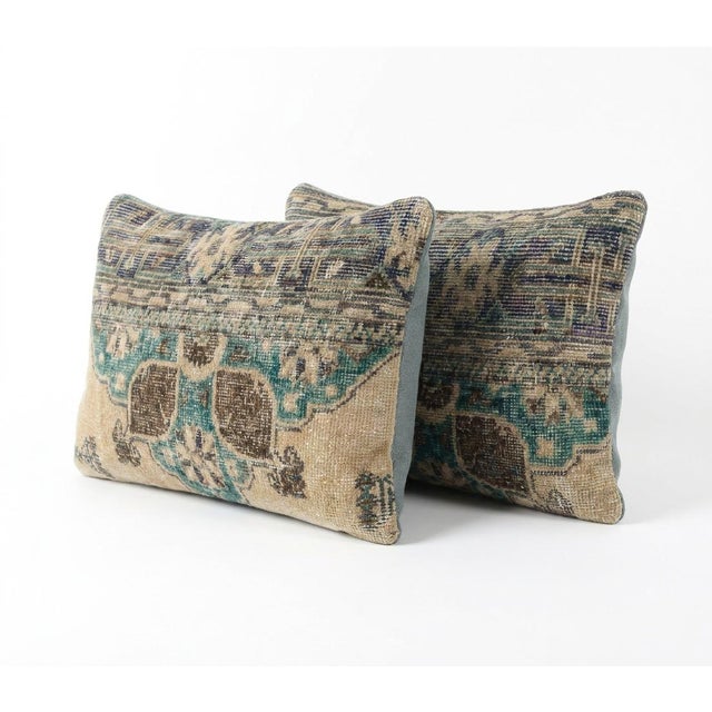 This beautiful 16'' x 24'' pillow cover set was made from authentic Turkish rug pieces. Bright colors of wool adorn the...