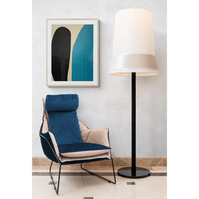 This original painting by Sarah Vaaler features organic shapes in black and teal on a cream background. Squiggly detail...