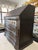 Three-drawer drop-leaf cabinet in brown lacquered wood with provision for lining the inside of the drawers with printed...