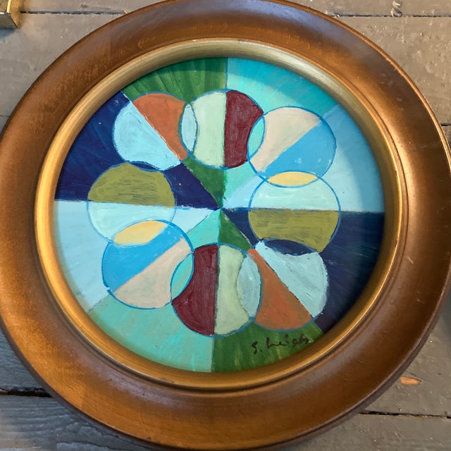 2 original round paintings on Masonite Overall size with vintage frame is approximately 10 x 10 both signed bottom right