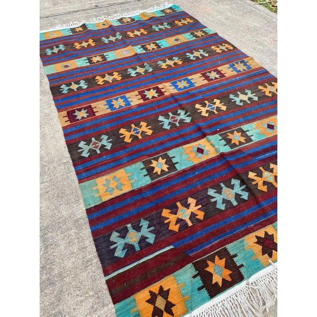 All rugs have been professionally cleaned; original condition is not altered, age-related wear is considered normal in...