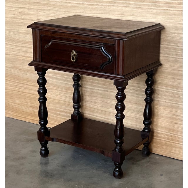 Spanish nightstands or side tables with one drawer and low shelve. Very heavy nightstands with carved details in the...