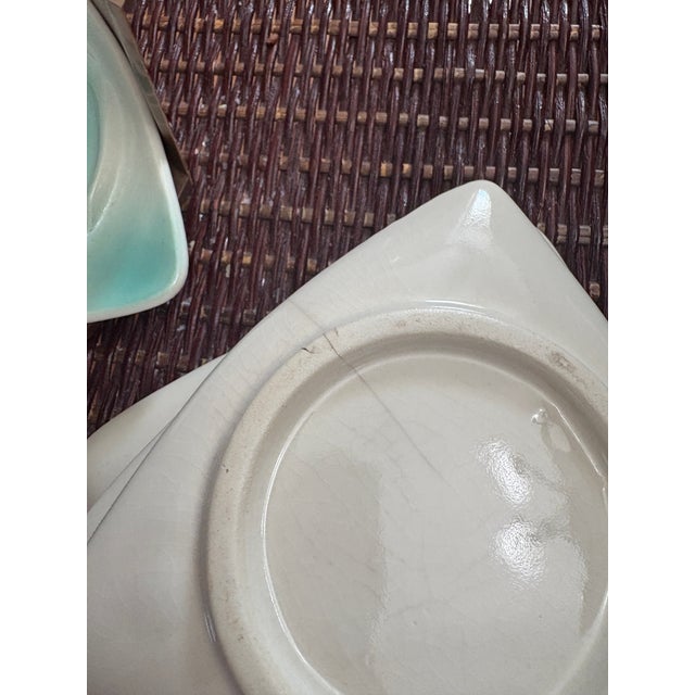 Mid Century Airbrushed Pottery Stackable Coasters with Green and White Roosters. There are 4 coasters in a plastic holder....