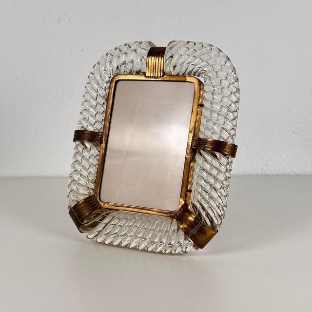 A truly rare and exquisite murano glass and brass photo frame by ercole barovier for barovier & toso, dating back to the...