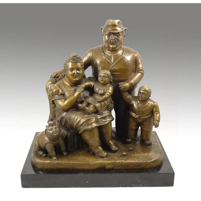 This solid bronze sculpture represents a family group composed of parents, children, and a pet. The work adopts the...