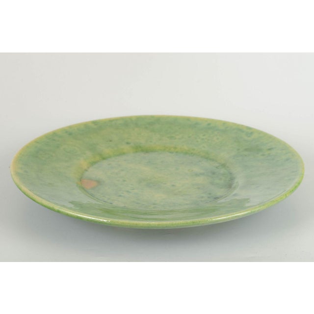 Biot Studio Potter Large ceramic dish, 1970/80s. Handmade stoneware dish with vivid green glaze featuring yellow nuances...