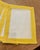Beautiful custom made fabric placemats, white center with yellow banding. Lined. linen and poly, washable, 12 x 16.