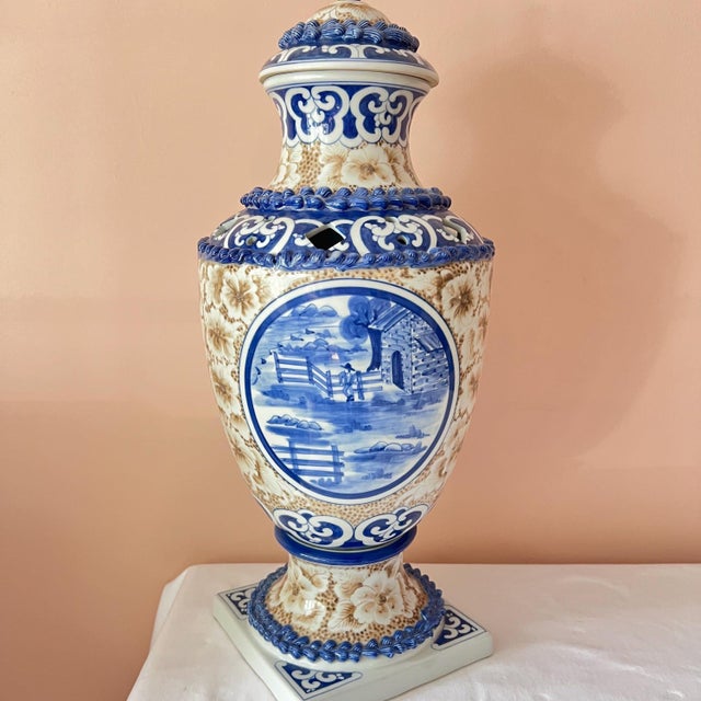 This is a stunning (and large!) lidded urn, made in Thailand for Maitland Smith, in a beautiful blue and white scenic...