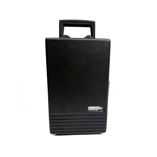 A rare and compact mid-century Executair 880 “The Original Trav-L-Bar” by Ever-Wear, designed for stylish entertaining and...