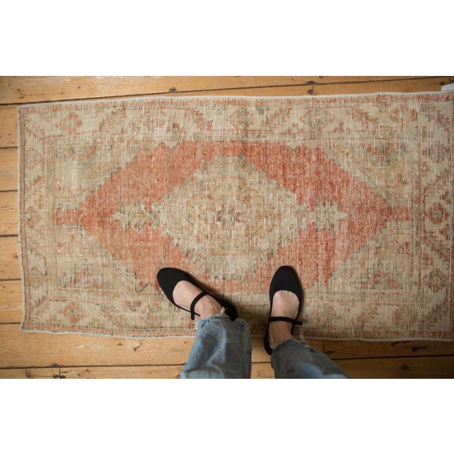 :: Diamond shaped concentric center medallions with interior pomegranate design element. Adorned at either end by minor...