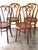 Vintage Mid-Century Thonet style cane chairs in excellent condition. Made in Romania. Chairs and cane are tight and add a...