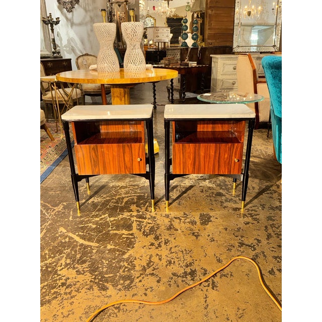 These Italian Art Deco style palisander side tables are perfect for those looking to add a touch of elegance to their...