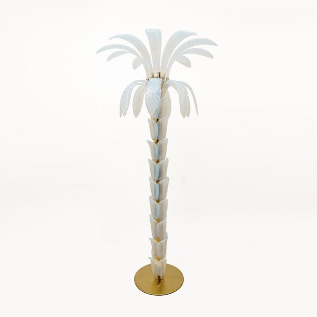 Pair of palm-shaped floor lamps in iridescent murano glass. italy, late 20th century evocative sculptural floor lamps...