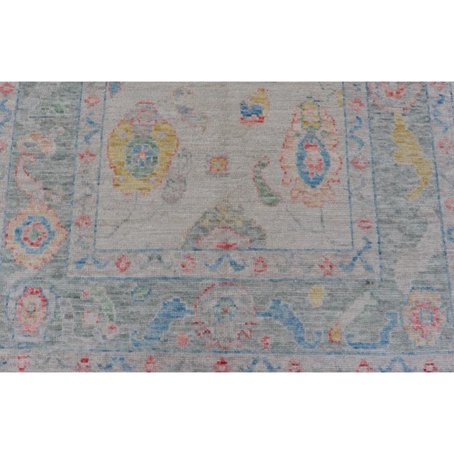 Textile Modern All-Over Floral Oushak With Muted Background and Accent Colors For Sale - Image 7 of 13
