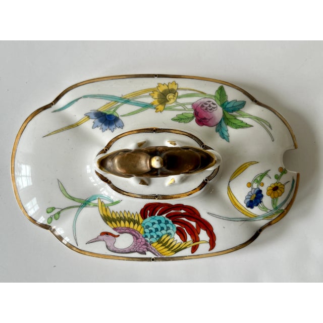 A Royal Worchester porcelain tureen, 1874. This rare tureen features elephant-form handles, hand-decorated Chinese-style...