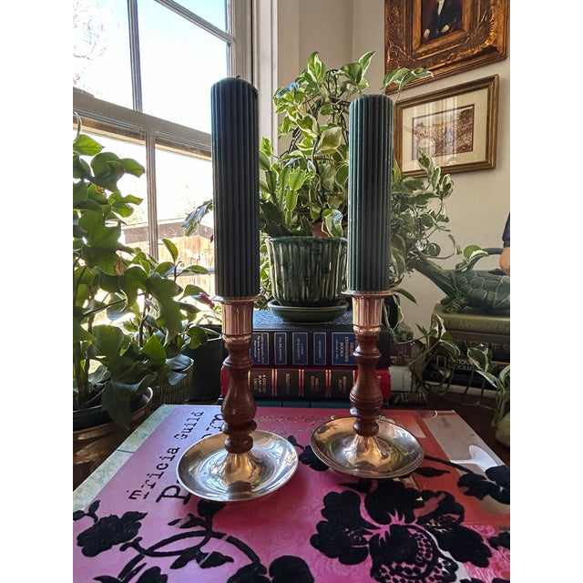 These vintage mahogany and brass candle holders are perfect to and to a centerpiece or to decorate and entry or mantle....