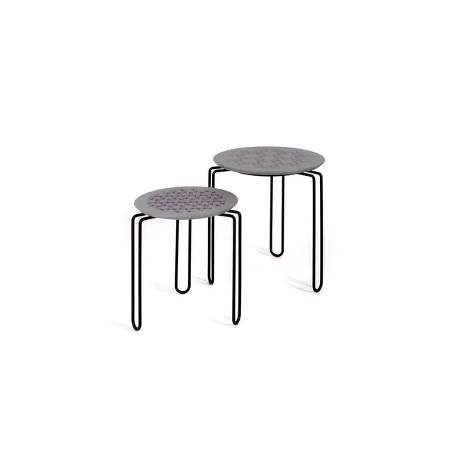 Set of 2 caleido coffee table by Mentemano Dimensions: 42 x H 47 cm 35 x H 41 cm Materials: Steel, wood. A bended steel...