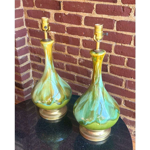 Item(s): Mid Century Drip Glaze Table Lamps Designer: Unknown Period: 1960s Place of Origin: U.S.A Materials: Ceramic,...