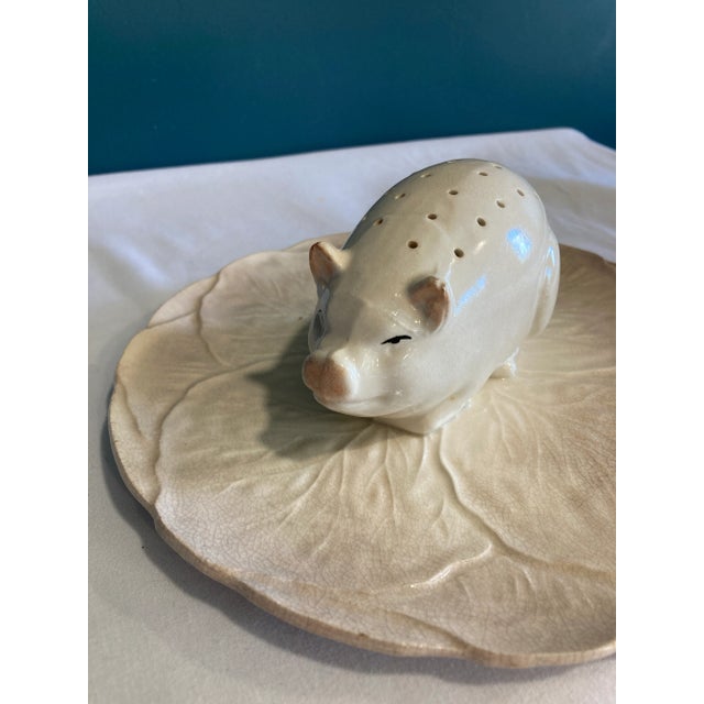 Infuse your space with character and charm with this whimsical vintage ceramic pig canapé holder, shaped like a peacefully...