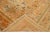 Beautiful vintage Turkish hand-knotted wool rug with a beige field. This rug has accents of orange and peach in a gorgeous...