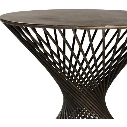 Industrial iron twist side table with a blackened gunmetal iron finish. Great unique side table for any industrial,...