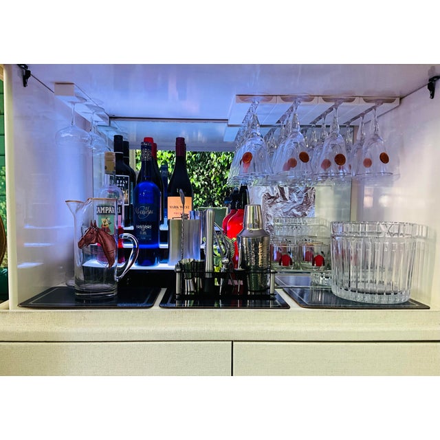 Who says the best cocktail bar in town can’t be hiding in your living room? Wrapped in beautifully painted raffia with a...