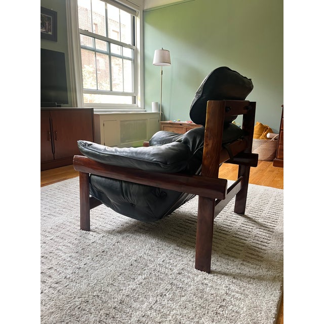Percival Lafter chair in rosewood and black leather. The chair is unmarked.