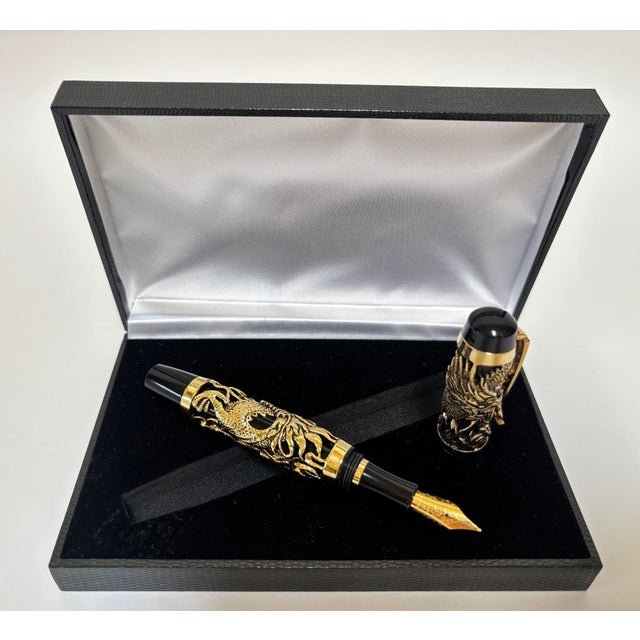 Acura Dragon Motif Fountain Pen, Gold Overlay on Black, Mint in Box, Late 20th Century A bold and highly decorative...