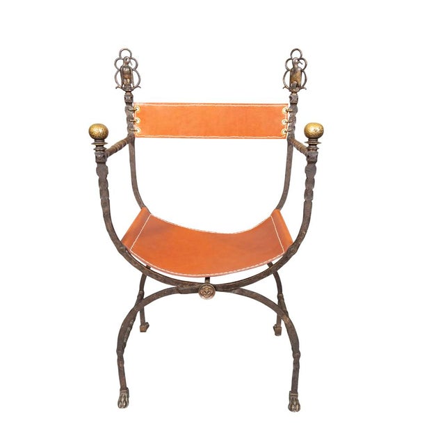 An unusual chair with new chestnut leather seat and back. Back with bird finials. Arched legs with paw feet. Chair can...