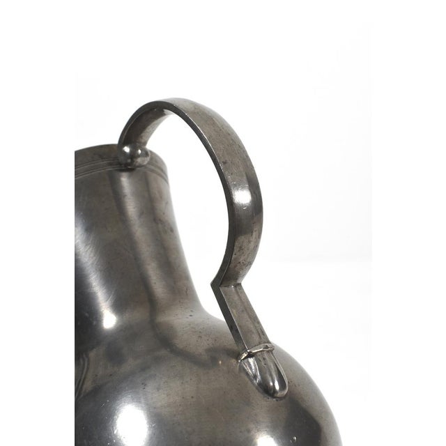 Beautiful pewter vase made by GAB (Guldsmedsaktiebolaget) in Stockholm, 1932. Combining the structured elegance of Art...