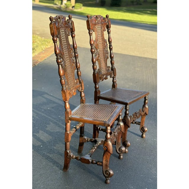 On offer is an extremely rare pair of fine late 17th Century beechwood caned chairs with The tall backs having caned...
