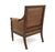 A handsome Sheraton-style library armchair crafted in the 20th century, featuring a richly patinated brown leather...
