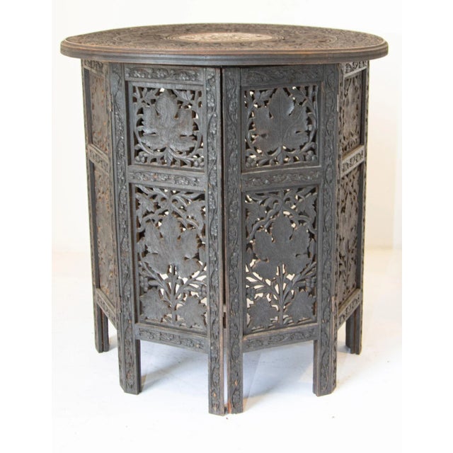 Antique 19th Century Intricately Carved Anglo-Indian Side Table. A beautiful finely carved British Colonial wooden...
