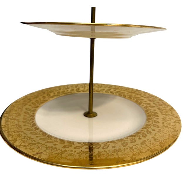 Vintage 2-tier serving tray by Sango in the Versallis pattern made with 22k gold. The serving tray features a white base...