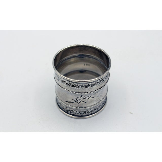 Elegant, large napkin ring anthemion borders, arches, and leaves. Coin silver, c.1860s. Unmarked except style #182. 1...