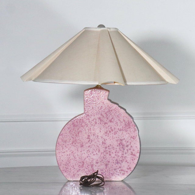 Fantastic pair of postmodern Memphis style lamps. Circa 1980’s. Glazed textured finish in shades of purple and pink....