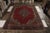 Handmade with hand-knotted wool originating from Turkey circa 1890-1900, this item is an antique rug enjoying an influence...