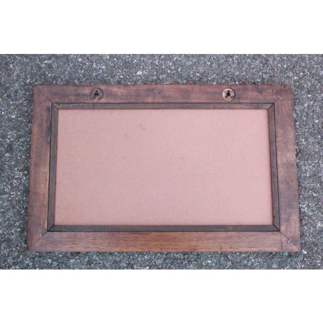 This beautiful Thai framed wall art measures 25” by 14”. It is framed in a brown wood frame which is 1” wide. The elephant...