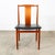 Solid teak dining chair by Henning Sorensen in original black vinyl. Classic look and design. Clean, functional and stylish.