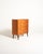 Scandinavian teak chest of drawers with four large drawers, brass handles, and tapered black lacquered legs, 1950s/1960s....