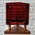 A triangular table lamp, model B100, designed under the pseudonym Mac Hegerup for the Swedish manufacturer Kronobergs...