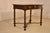 Late 17th/early 18th century oak side table from England. The top has lovely patina and graining, and has a beveled edge,...