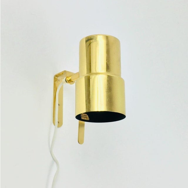 Stunning pair of polished brass wall lights/sconces designed by the famous swedish designer hans-agne jakobsson and...