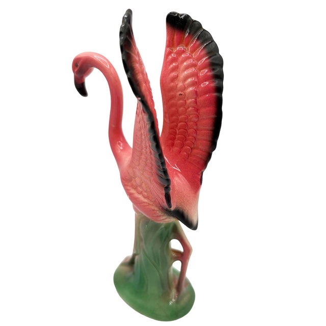 Mid-Century pink and green ceramic tabletop pottery statue by Leftons. The statue features a beautifully detailed pink...