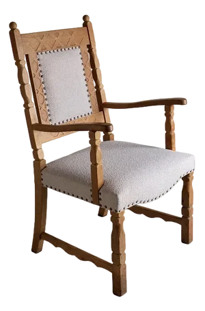 Carved Oak Armchair attributed to Henning Kjaernulf, Denmark, 1960s