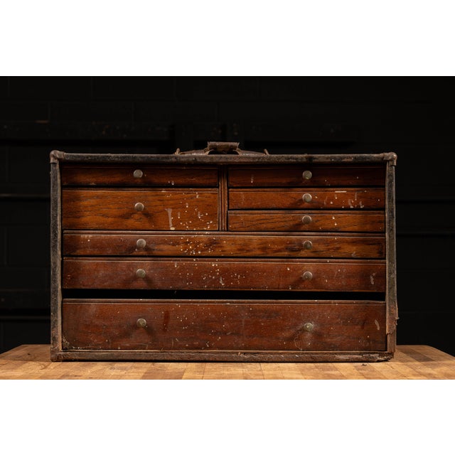 c. 1920s - 1930s Industrial storage chest with steel exterior and oak body. This piece features all-original hardware and...