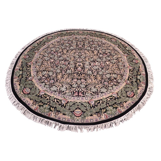 This hand‑knotted Pak Persian round rug showcases the finest expression of traditional Persian artistry. Each piece is...