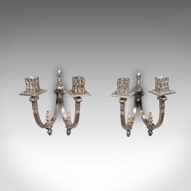 This is a pair of antique candle sconces. A French, silver plated wall light in Art Nouveau taste, dating to the late...