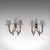 This is a pair of antique candle sconces. A French, silver plated wall light in Art Nouveau taste, dating to the late...