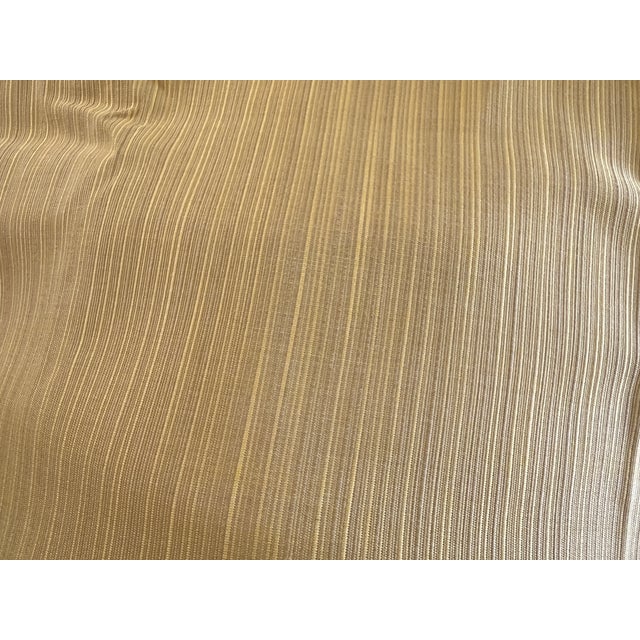 Brunschwig&Fils golden color ottoman a little over 1 yd 56”w by 46” long